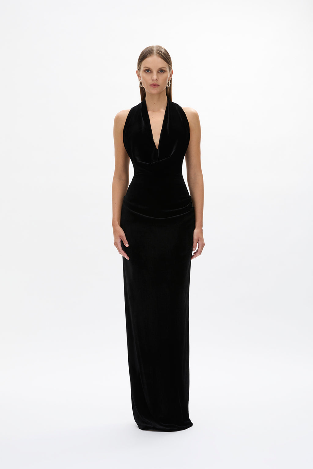 Second front image of model wearing Rachel Gilbert Martin Plunge Gown, black velvet halter gown with deep plunge neckline and internal corset.