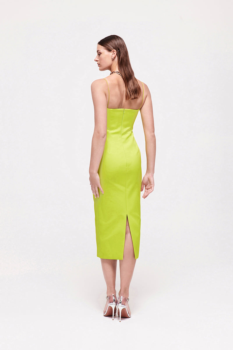 Back image of model wearing Bodie Dress in Neon featuring sweetheart neckline and thin straps, falling to a mid-length silhouette.